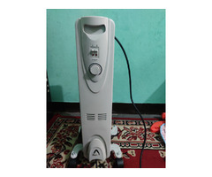 Oil filled radiator heater